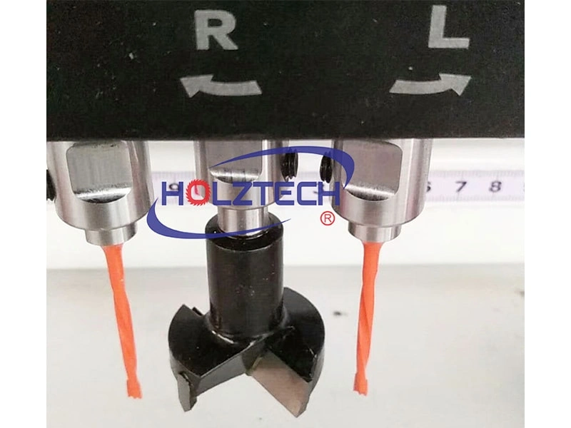 Drill head with 3 drill bits