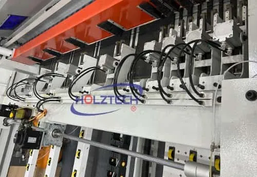 Board clamps to hold and feed the board with high precision.