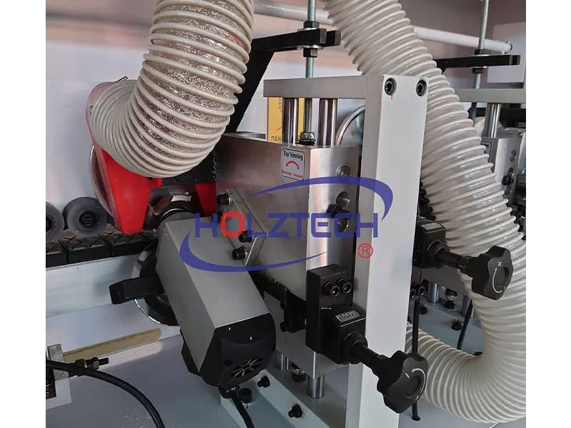 Fine Trimming.  Large diameter copy wheel - Ø 180 mm and round conical copy wheel Ø 120 mm ensure the accuracy of workpiece positioning.   The aspiration system effectively removes chips from the trimming and scraping area. Clean space  ensures high quality processing. 